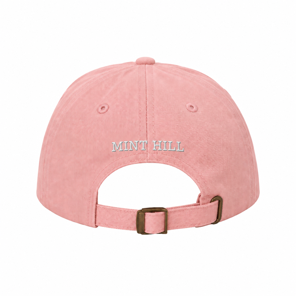 Pink cap with Mint Hill embroidery and adjustable strap, showcasing hometown pride.